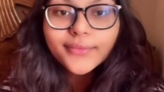 Beautiful Glasses Girl Playing with her Huge Boobs